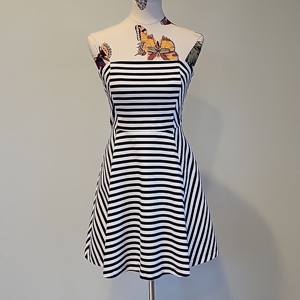 EXPRESS black and white strapless dress.  Form fitting with flared skirt. Size 4